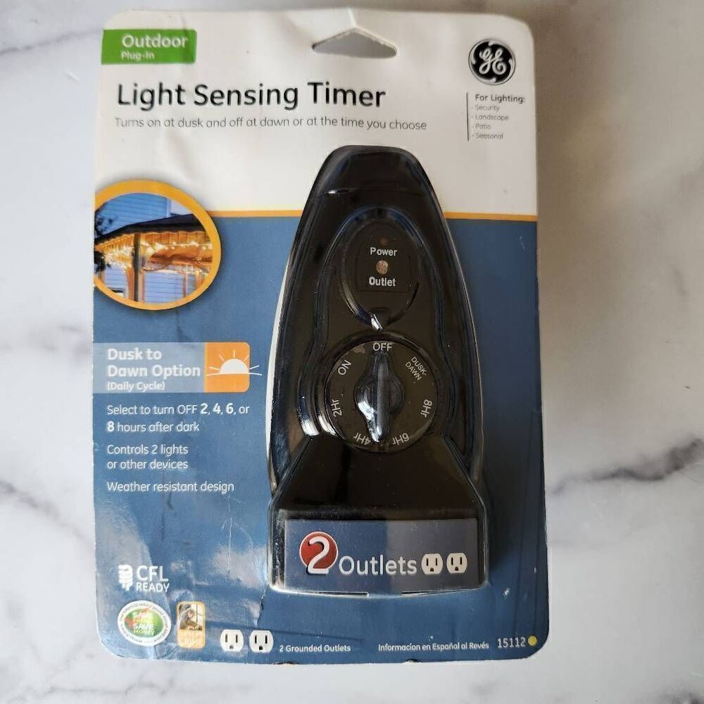 GE light sensing timer outdoor light new in package